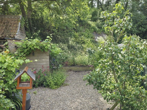 Gezellige instapklare woning met mooie zonnige tuin