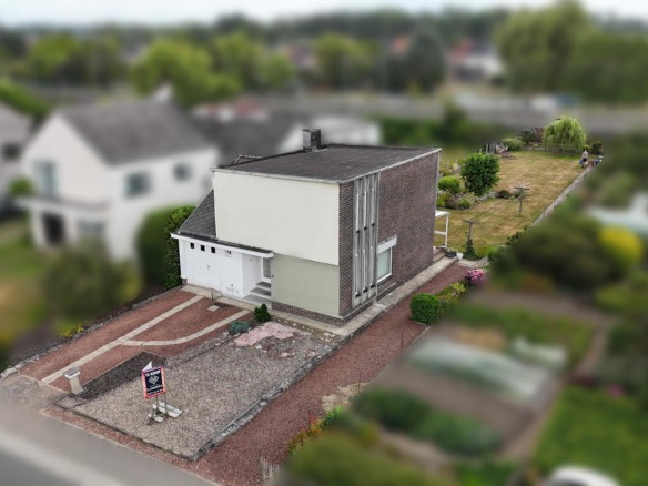 Unieke architecturale woning op een mooi perceel